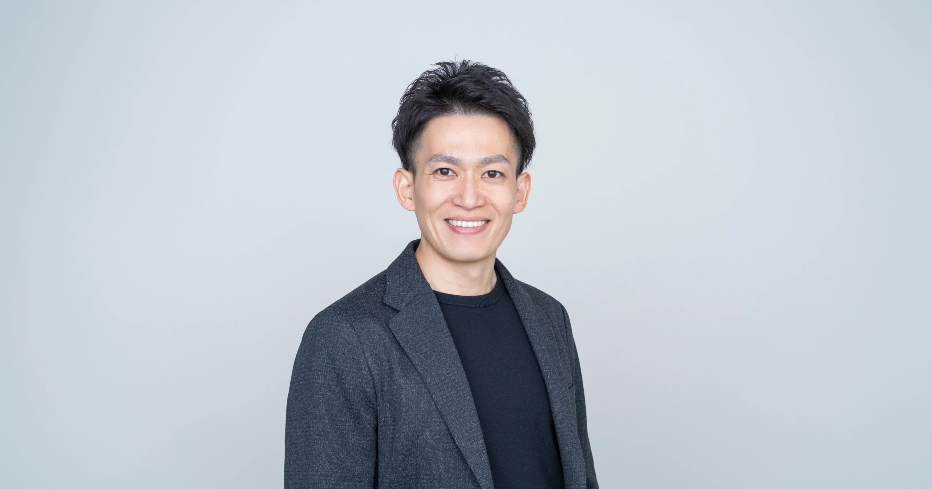 岡本 吉史 のポートレート